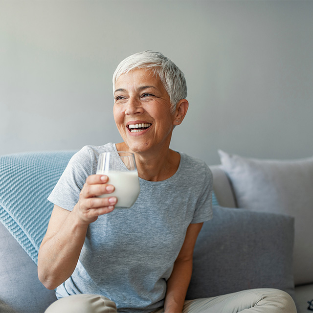 smiling woman with drink